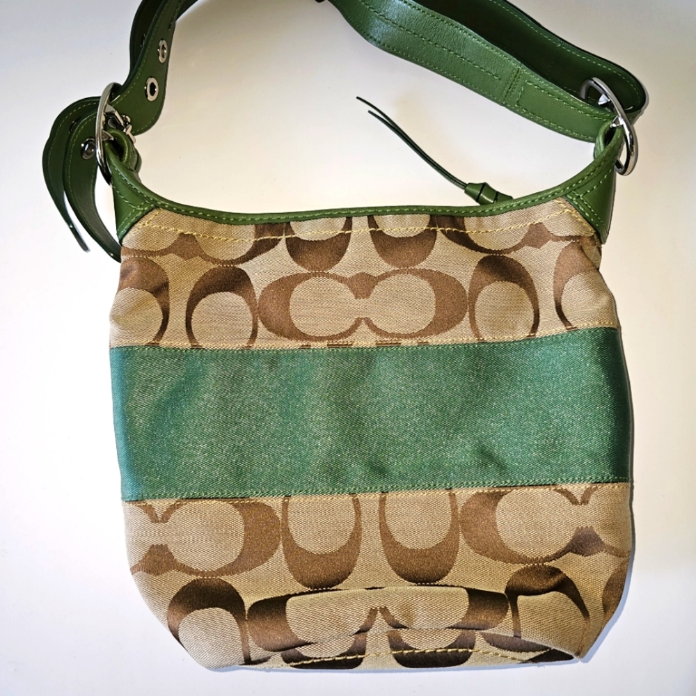 Coach brown with green stripe across. Good used condition.